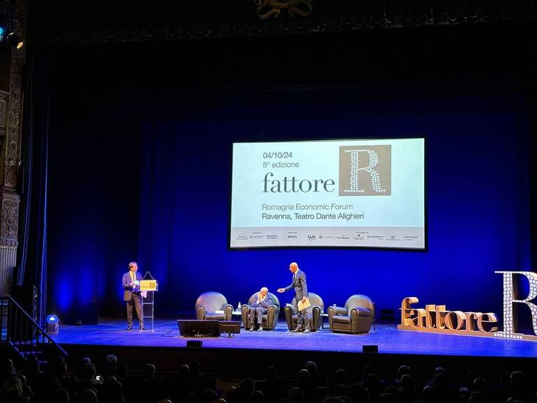 Un momento di Fattore R oggi a Ravenna. Battistini è seduto, al centro nella foto.